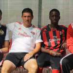 Timothy Weah with George Weah and the technical staff of the AC Milan Academy Camp