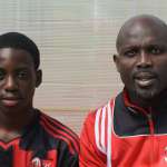 Timothy Weah with George Weah at the AC Milan Academy Junior Camp