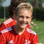 Pobega Tommaso has fun playing football soccer at the AC Milan Junior Camp of Sporteventi